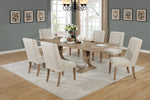 7 piece traditional dining set with wooden table and upholstered beige dining side chairs with button tufting