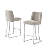 Two gray boucle bar stools with metal legs