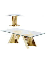 Modern glass coffee table with geometric gold chrome-finished base and clear glass top showcasing contemporary furniture design
