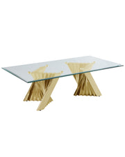 Modern rectangular glass coffee table with sculptural gold stainless steel base.
