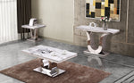 White marble coffee table set with U-shaped chrome base and matching side table, styled in modern living room.