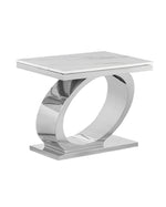 Modern white marble end table with polished silver stainless steel oval base.