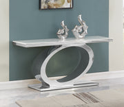 Modern white marble console table with oval stainless steel base and silver metal sculptures