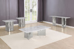 A modern 4 piece set featuring a rectangular coffee table, two matching side tables, and a long console table, all with polished silver steel bases and white marble-patterned tops