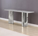 Contemporary console table with white marble top and polished stainless steel double pedestal base