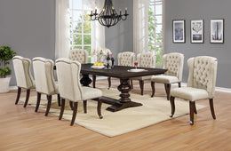 Traditional 9 piece dining set with dark wood table and beige upholstered chairs