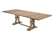 A rustic extendable dining table with a light brown wood finish and trestle-style legs, and 2 removable leaves