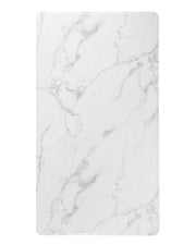 Overhead detail shot of white marble pattern with soft gray veining and rounded corners